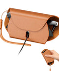 Portable Magnetic Charging Case For Ray Ban Meta Smart Glasses Gen 1 And Gen 2 in brown leather with charging cable and hand view