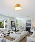 Modern 3 Light Flush Mount Ceiling Light With Fabric And Acrylic Double Drum Shade In Flaxen in a bright living room