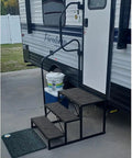 Heavy Duty Three Step RV Stair With Solid Handrail Steel Frame Rated For 600 LBS Load Capacity at RV entry.