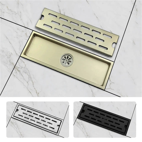 Brushed Gold Linear Shower Drain With No Sweat Hair Catcher For Bathroom Kitchen Or Toilet Durable Waste Grate on a tiled floor.