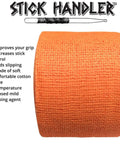 Top Shelf Non Slip Drumstick Grip Tape That Locks Down Your Sticks And Keeps Your Sweat At Bay For Killer Live Sets Or Practice Sessions In Bright Orange Soft Cotton Material, shown in roll format.