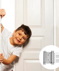 Child by door with Automatic Two Way Door Spring Hinge With Adjustable Self Rebounding Action And Heavy Duty Steel Construction Inset