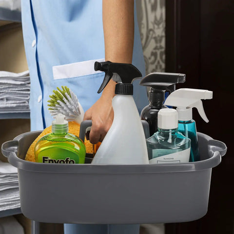 Person carrying a large cleaning supplies caddy organizer bin with handle for dorm garden bathroom under sink storage tote