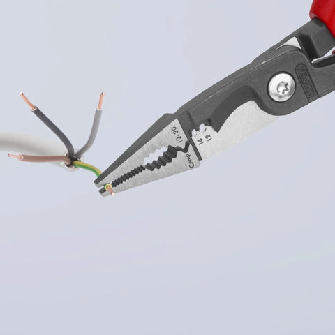 Six In One Electrical Installation Pliers With Comfort Grip Handles for cutting copper cables in use, close-up view