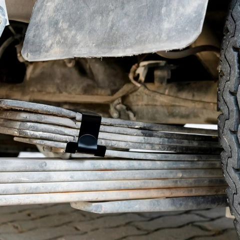Four Piece Stainless Steel Leaf Spring Clamp Kit For Three Inch Wide Leaf Springs With Bend Repair Clips on axle view