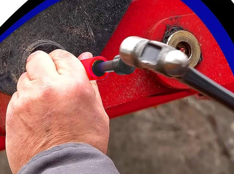 Man using Grease Fitting Cleaner Tool Kit Hydraulic Powered Zerk Buster And Rejuvenator on red machinery joint