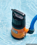 Heavy Duty Submersible Water Pump With 25 Foot Hose Offering One Point Two Horsepower And Five Thousand Gallons Per Hour Output in pool water.