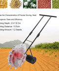 Hand Push Garden Seeder With Roller Seed Planter And Fertilizer Applicator, 13.5cm Spacing, shown in a field.