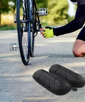 Cyclist adjusting bike next to Hard Shell Bike Tool Bag With EVA Bottle Cage And Mesh Pockets Wear Resistant ABS Frame Mount Organizer