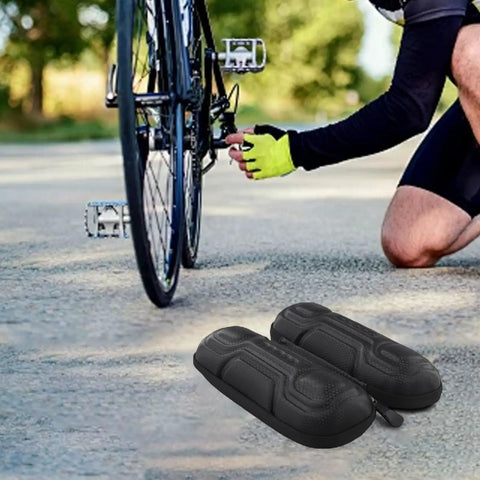Cyclist adjusting bike next to Hard Shell Bike Tool Bag With EVA Bottle Cage And Mesh Pockets Wear Resistant ABS Frame Mount Organizer