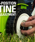 Close-up of a hand adjusting the 3-position tine setting on a 10 Amp 14 Inch Corded Electric Dethatcher With Stainless Steel Tines For A Healthier Lawn