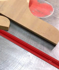 Aluminum T Track Miter Jig For Woodworking Router Table With Red T Slot Track And Quick Acting Clamp, wooden surface, metal table