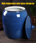 Kitchen Game Changer Top Shelf Blue Porcelain Rice Jar Snug Sealed Grain Bin for Flour Coffee or Tea Heavy Duty Storage Bucket with Locking Lid, side view.