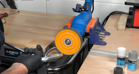 Using a metal buffing and polishing kit for drill with 4-inch buffing wheels and 3-step polishing compound on a golf club head.