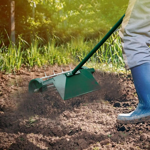 Rolling Lawn Aerator With Fender and 18 Inch Spike Roller in use on soil, showing 50 Inch Anti Slip Handle for effortless yard care.