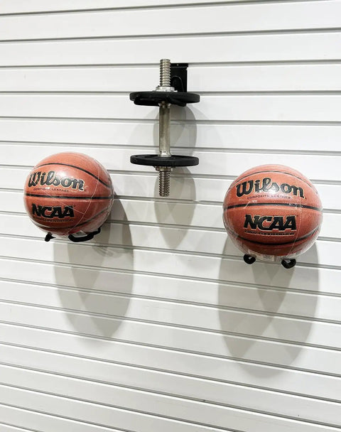 Basketballs and dumbbell on slatwall with Beefy Power Tool Slatwall Organizer Kit With Anti Slip Weedeater Rack Trimmer Holder Drill Holder And 620 Series Slatwall Hooks For Garage Tool Storage Yard Tools And Workshop Organization.