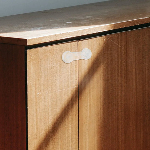 Easy Install Kid Safe Cabinet Locks For Drawers And Fridges, 10 Pack ABS Adhesive Safety Latches on wooden cabinet