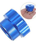 Blue Alloy Valve Stem Knob With 6mm Hole Replacement for outdoor water spigot handle shown in hand for size reference.
