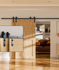 Installed 12 Foot Bypass Sliding Barn Door Hardware Kit With Single Track For Double Doors in a living room setting