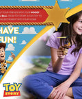 Child playing with Woody Inspired Toy Story Flying IR UFO Helicopter With Motion Sensing Hover, Hand Controlled Toy, Toy Story theme.
