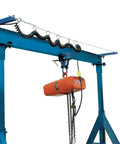 Festoon System 22 Ft Kit For Gantry Crane Models Power Cord Protection installed on a blue gantry crane with hoist cable.