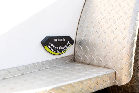 Senior Inclinometer and Tilt Gauge for RVs, Trailers, Campers, and 5th Wheels With High-Bond Adhesive Backing mounted on metal surface