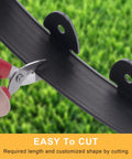 Cutting black lawn border from 40 Foot Landscape Edging Kit With 2 Inch Tall Black Lawn Border Pro Grade Build Includes Scissors 36 Garden Spikes And 2 Connectors Heavy Duty PP And PE For Neatly Defined Gardens Lawns And Landscaping