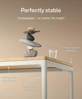 Rock Solid Electric Standing Desk Gliding Smoothly On Ultra Quiet Quad Motors Sixty Three Inch Worktop showcasing stable design with rock balancing.