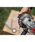Top view of Badass Brushless 4 Inch Cordless Angle Grinder With A Sick Ergonomic Grip showing the blade and controls.