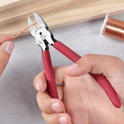 Person using 6 inch ultra sharp side cutter snips with extra long flush cutting edge for clean flat cuts, cutting copper wire