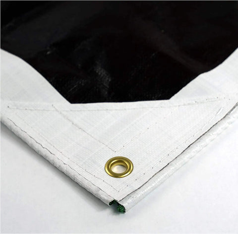 Corner detail of HydraTarp Super Beefy Heavy Duty 16 Mil Tarp, 18 By 24 Feet, reversible white and brown with brass grommet.