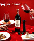 Keep Wine Fresh Up To 7 Days With This Reusable Vacuum Pump And Four Stopper Set on red table with wine and desserts