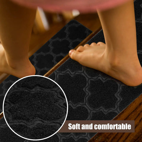 Child stepping on non slip stair treads carpet with pattern, showcasing soft texture. Non Slip Stair Treads Carpet For Wooden And Tile Steps 8x30 Inches 15 Pack Easy Install With Reusable Adhesive Safe For The Elderly Children And Pets