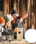 Family working on a wooden birdhouse project in a workshop with a focus on using screws.