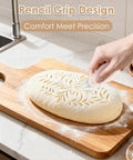 Beige Magnetic Bread Lame For Home Bakers And Dough Nerds With Dual Sided Locking Blade scoring dough on cutting board