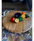 Turquoise Barrel Head Lazy Susan 10 Inch Wooden Turntable Serving Tray with fruit and candle on table