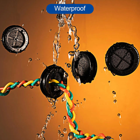 Waterproof Set Of Four Rubber Grommets For Firewall Cable Protection with wires, black, shown under water spray.