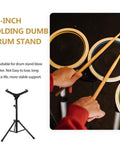 Badass Adjustable Snare Drum Rack And Practice Stand With Rock Solid Non Slip Base Plus Straight Up Portable Double Drumstick Shelf And Quick Hinge Height Adjustment For Pro Music Gear, featuring 12-inch folding drum stand with drumsticks.