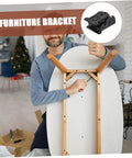 Man installing space-saving folding hinge set on table for easy transformation and space optimization in small rooms and DIY projects.