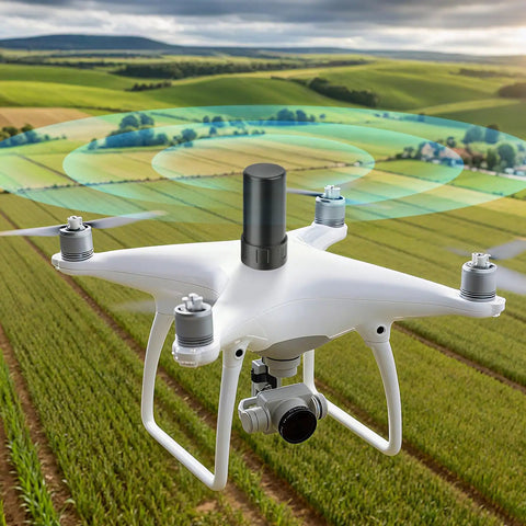 Drone equipped with Four System GNSS Helix Antenna For GPS BeiDou GLONASS Galileo With 28dB High Gain, flying over farmland.