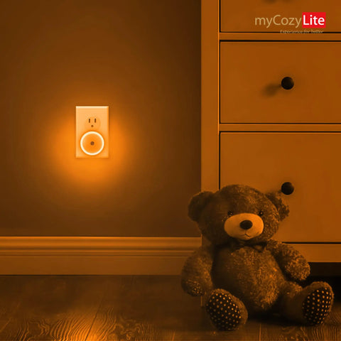 Amber Night Light Plug In Dusk To Dawn Sensor Night Light With Amber Glow And Blue Light Blocking in a bedroom at night