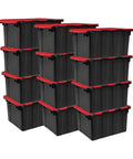 Haul Heavy Loads With Ease Using These Tough As Nails 12 Gallon Storage Totes With Secure Lids For Garage Organization Stackable Heavy Duty Crates Featuring Tie Down Grommets In A Rock Solid 12 Pack Bundle, featuring black bins with red lids, stacked for garage storage.
