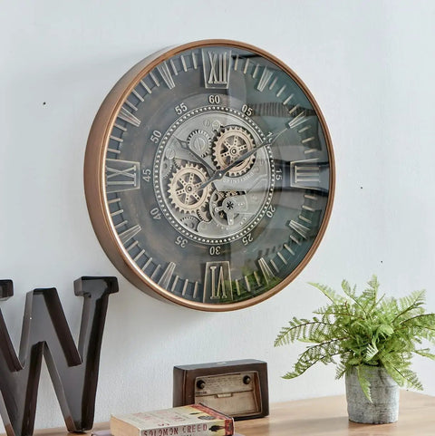 Killer Twenty Four Inch Oversized Wall Clock Featuring Real Moving Gears Heavily Distressed Antique Gold Dial Bold Roman Numerals on wall.