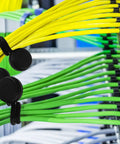 Slick Magnetic Silicone Cable Ties 10 Pack organizing yellow and green cords on a rack for easy access.