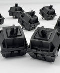 Oil King V2 Pre-Lubed Black Linear Keyboard Switches Pack Of 10, close-up view of switches on white background