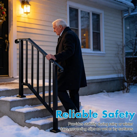 Heavy Duty Carbon Steel Handrails For Outdoor Steps Slick 2 Step Stair Rail Kit, assisting a man up snowy steps with reliable support.