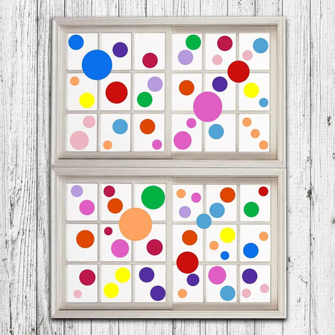 264 Piece Polka Dot Wall Decals Set Colorful Vinyl Circle Dots for Walls Perfect for Kids Bedrooms Nurseries Playrooms and Classrooms 7 Sizes 12 Bright Colors Easy Peel And Stick Stickers displayed on a window.
