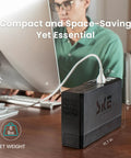 Uninterruptible Power Supply With AVR Battery Backup And Surge Protector for home office next to a computer setup, 7 outlets.