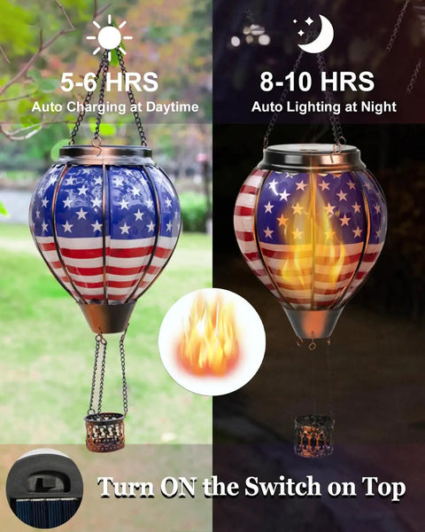 Solar Hot Air Balloon Lantern With Flickering Flame, Glass Outdoor Hanging Lantern For Patio Porch Yard, showing American flag design during day and night