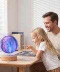 Father and daughter enjoy Levitating Moon Lamp 5.9 Inch Magnetic Floating Moon Light With Remote 3D Galaxy Moon Lamp on wooden desk.